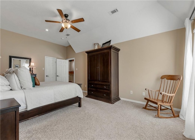 bedroom with lofted ceiling, light colored carpet, a ceiling fan, baseboards, and visible vents