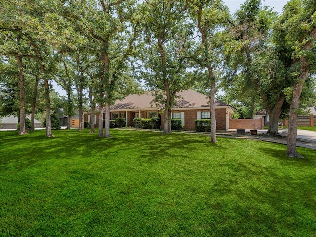 exterior space with a front yard