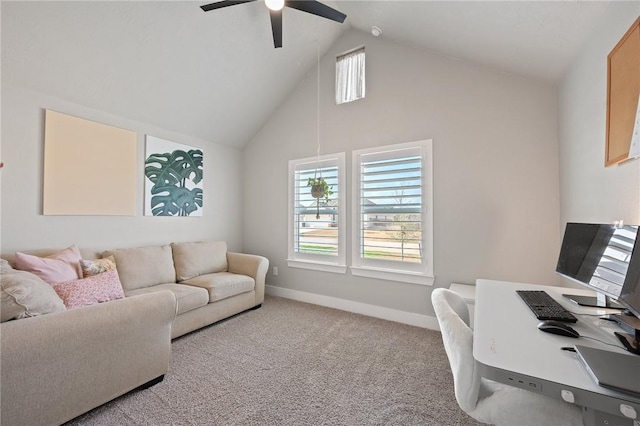 carpeted office space with high vaulted ceiling and ceiling fan