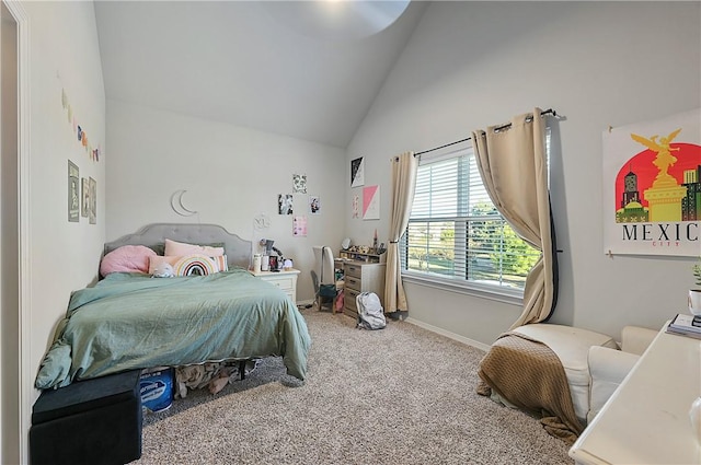 303 Luther St, College Station, TX 77840 - bedroom with carpet flooring, baseboards, and high vaulted ceiling