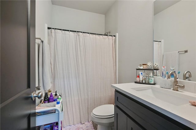 303 Luther St, College Station, TX 77840 - bathroom featuring toilet and vanity