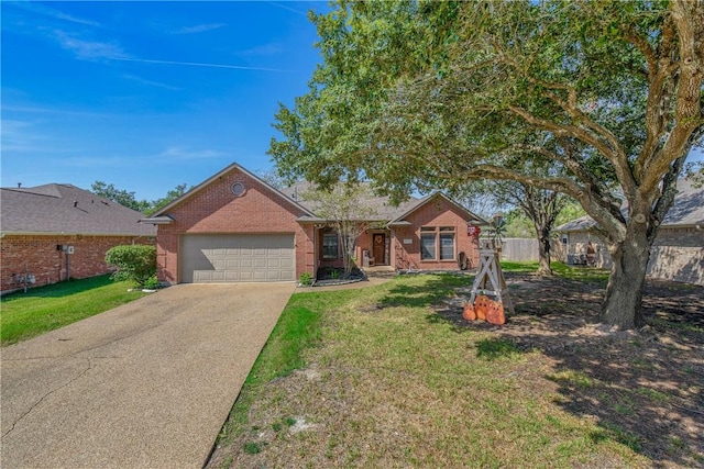 ranch-style home with a garage and a front yard