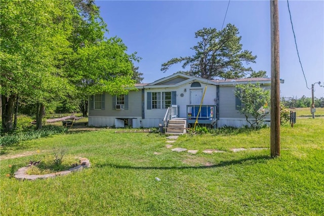 180 Fcr 797, Donie, TX 75838 - manufactured / mobile home featuring a front lawn