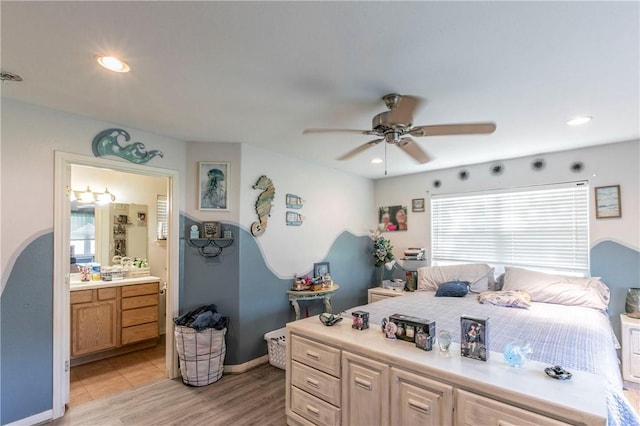 180 Fcr 797, Donie, TX 75838 - bedroom featuring ensuite bath, light wood finished floors, a ceiling fan, baseboards, and recessed lighting