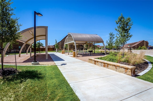 view of home's community featuring a yard