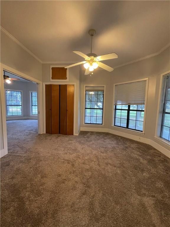 6268 Fm 2269, Cameron, TX 76518 - unfurnished living room with ceiling fan, carpet floors, crown molding, and baseboards