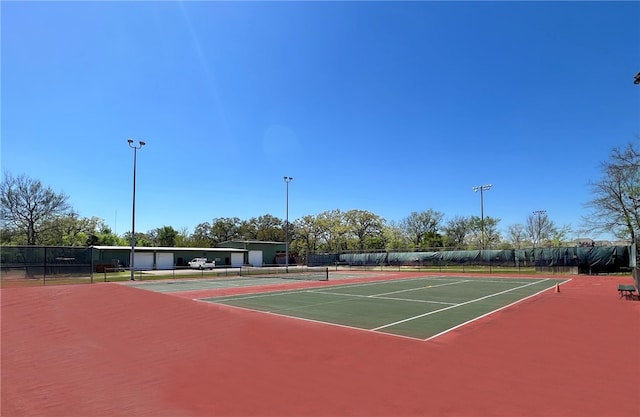 view of tennis court with basketball court