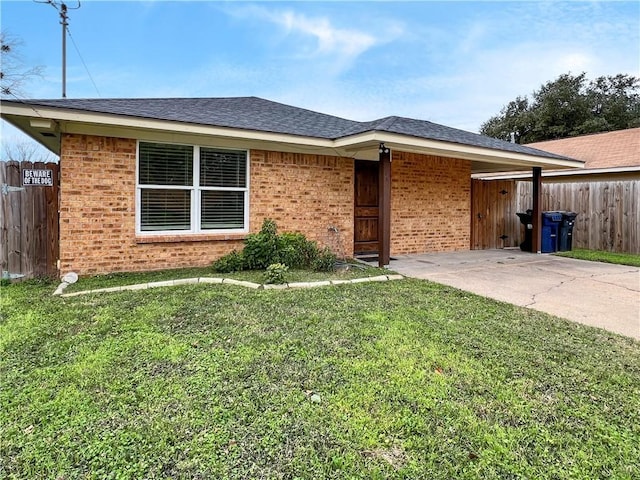 ranch-style home with a front lawn