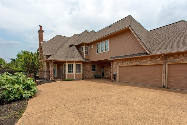 view of front of property with a garage