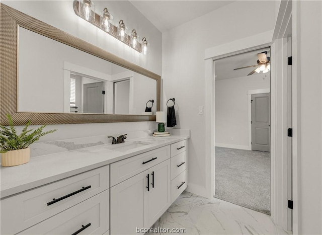 2023 Lola Ln, Bryan, TX 77807 - bathroom with vanity, marble finish flooring, and ceiling fan