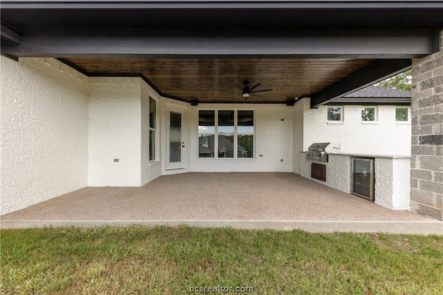 view of patio featuring ceiling fan and area for grilling