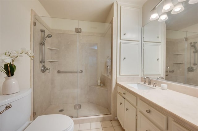 1818 Laura Ln, College Station, TX 77840 - full bath featuring toilet, a stall shower, vanity, and tile patterned floors
