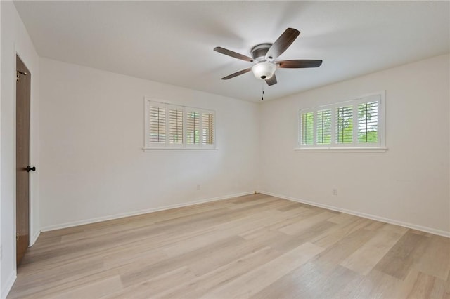 1818 Laura Ln, College Station, TX 77840 - unfurnished room with light wood-type flooring, a ceiling fan, and baseboards