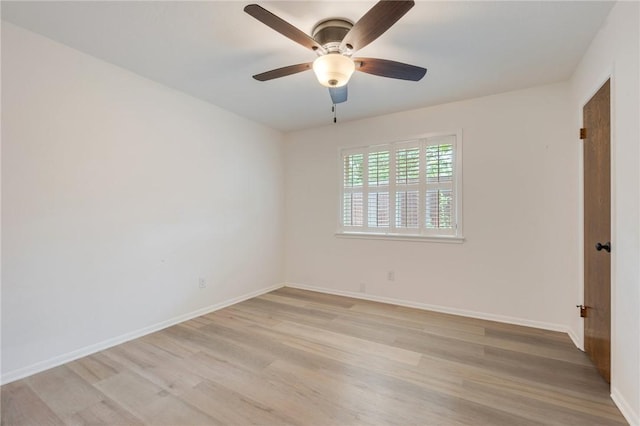 1818 Laura Ln, College Station, TX 77840 - spare room with light wood finished floors, baseboards, and ceiling fan