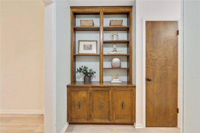 1818 Laura Ln, College Station, TX 77840 - detailed view of baseboards and wood finished floors