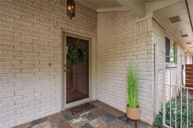 1818 Laura Ln, College Station, TX 77840 - view of exterior entry featuring brick siding