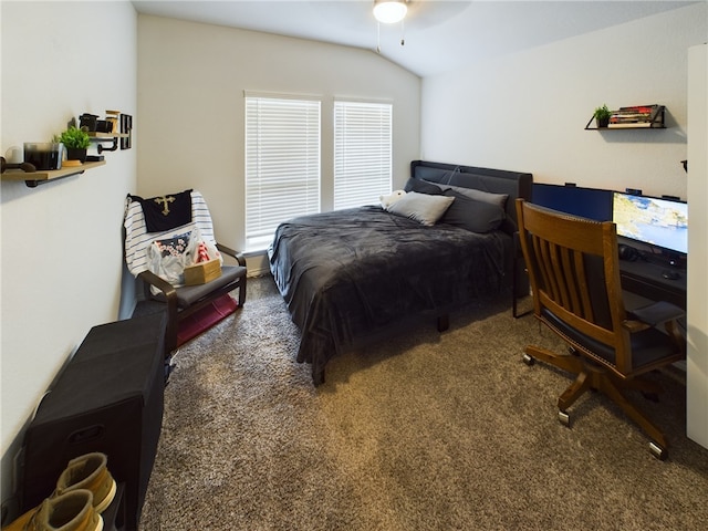 carpeted bedroom featuring vaulted ceiling and ceiling fan