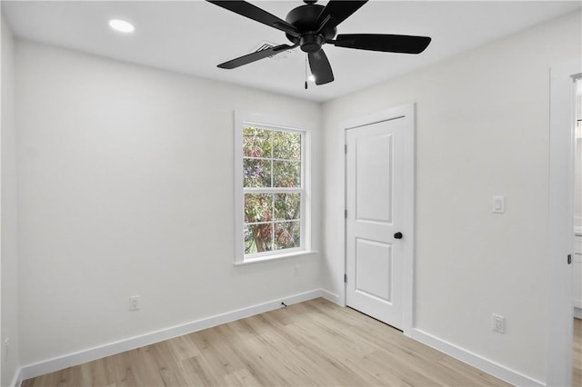 unfurnished bedroom with light hardwood / wood-style floors and ceiling fan