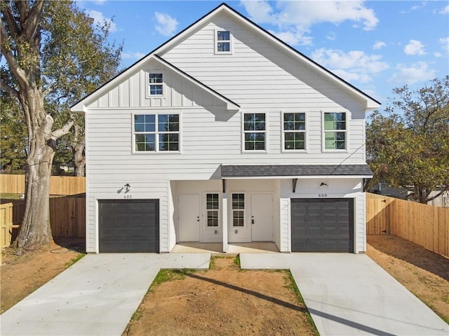 view of front of property with a garage