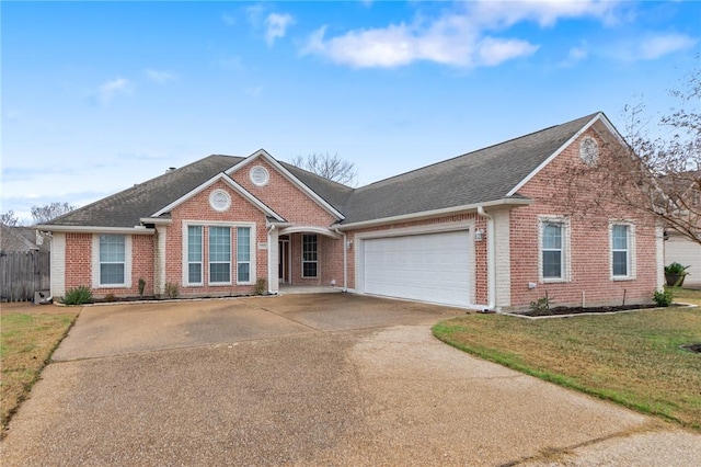 view of front of home featuring a garage and a front yard