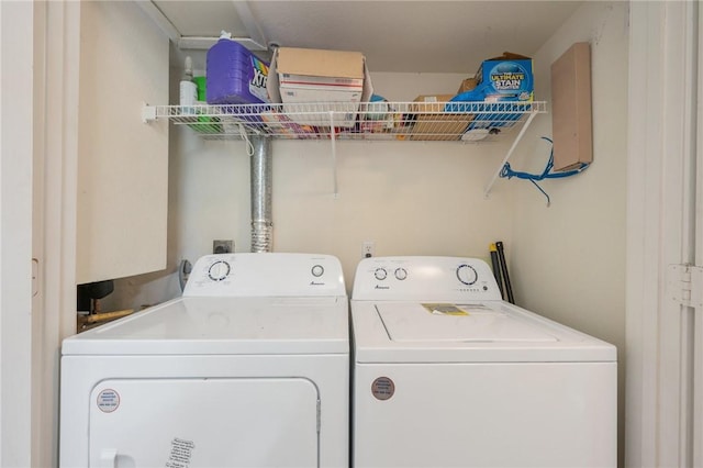 laundry room featuring separate washer and dryer