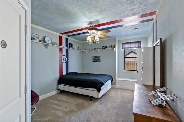 bedroom featuring carpet flooring, a textured ceiling, crown molding, and baseboards