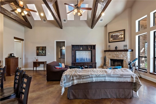 tiled living area with high vaulted ceiling, visible vents, and ceiling fan