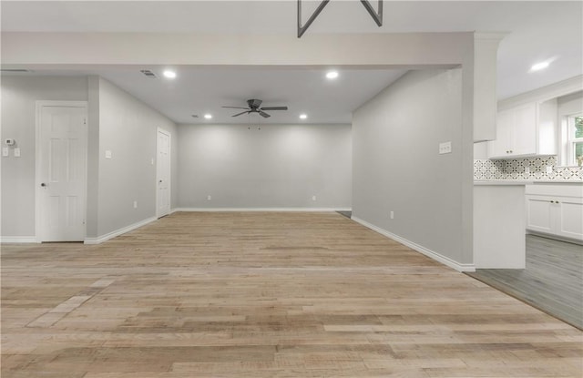 interior space featuring ceiling fan and light hardwood / wood-style floors