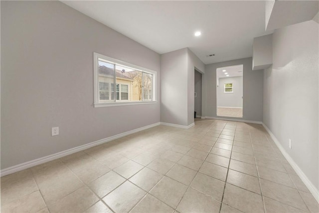 view of tiled spare room