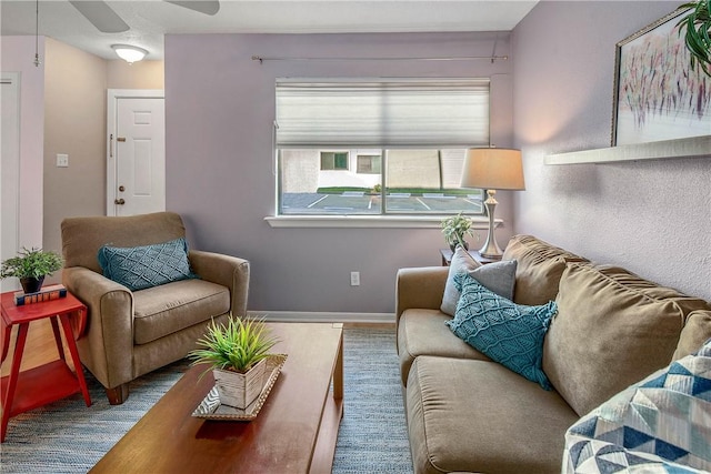 living room with ceiling fan