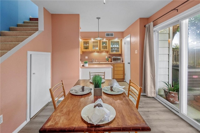 dining room featuring light hardwood / wood-style floors