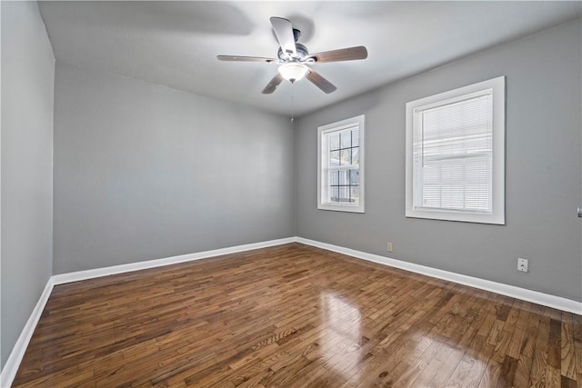 unfurnished room featuring hardwood / wood-style flooring and ceiling fan