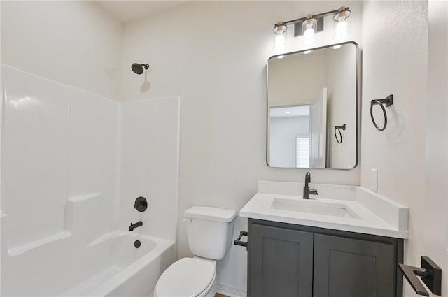 full bathroom with vanity, toilet, and shower / washtub combination