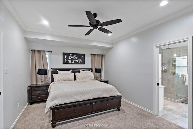 carpeted bedroom with multiple windows, ceiling fan, ensuite bathroom, and ornamental molding