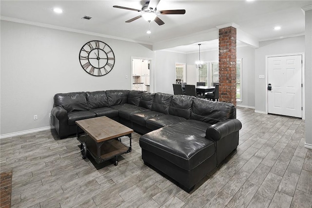 living room with ceiling fan, wood finished floors, baseboards, recessed lighting, and crown molding