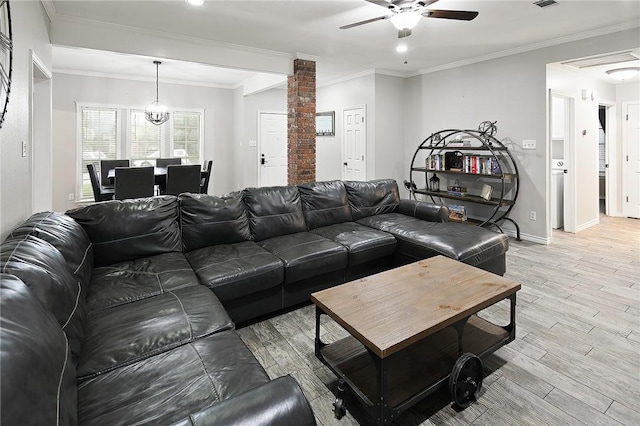 living room featuring a ceiling fan, ornate columns, light wood finished floors, ornamental molding, and recessed lighting