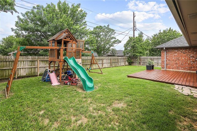 view of play area with a wooden deck