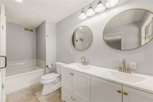 714 S Rosemary Dr, Bryan, TX 77802 - full bath with a garden tub, double vanity, and tile patterned floors