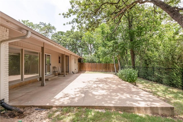 714 S Rosemary Dr, Bryan, TX 77802 - fenced backyard with a patio