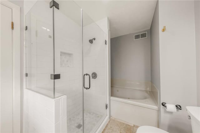 714 S Rosemary Dr, Bryan, TX 77802 - bathroom featuring a garden tub and a shower stall