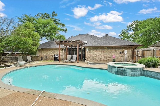 view of pool featuring an in ground hot tub, grilling area, and a pergola