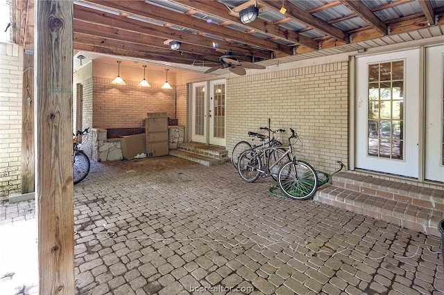 view of patio / terrace with ceiling fan and french doors