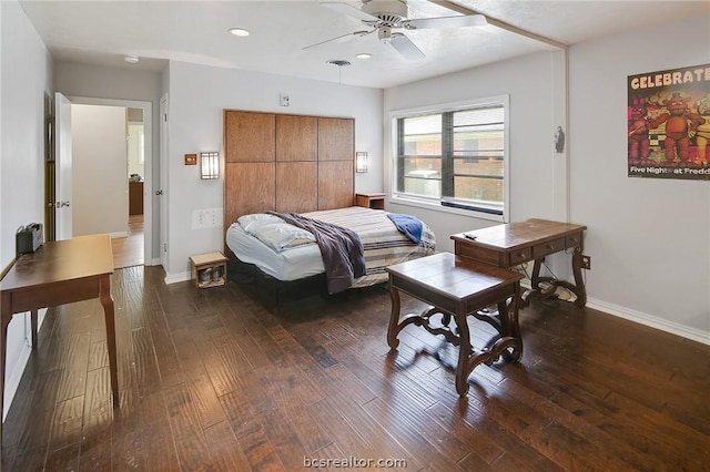 bedroom with ceiling fan and dark wood-type flooring