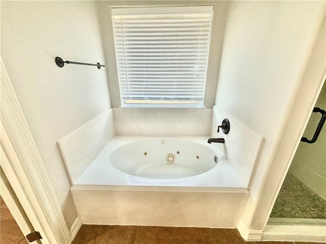 bathroom with tile patterned flooring and plus walk in shower