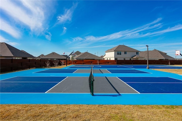 view of tennis court with basketball court