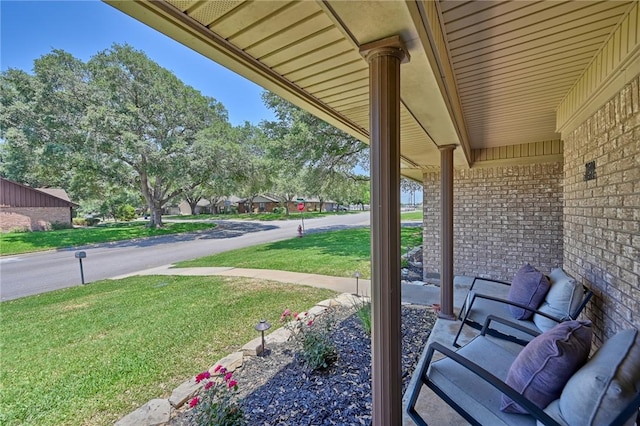 1600 Pecan St, Brenham, TX 77833 - covered porch featuring a lawn