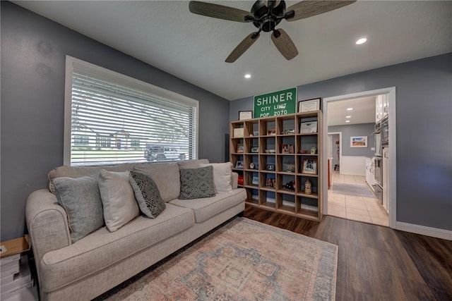 1600 Pecan St, Brenham, TX 77833 - living room with wood finished floors, a ceiling fan, recessed lighting, and baseboards