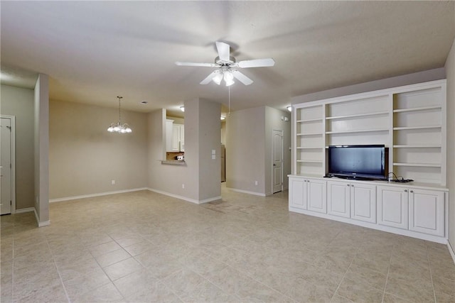 unfurnished living room featuring baseboards, light tile patterned floors, and ceiling fan with notable chandelier