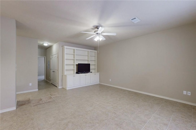 unfurnished living room featuring visible vents, a ceiling fan, and baseboards