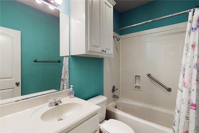 bathroom featuring vanity, shower / bath combo, and toilet